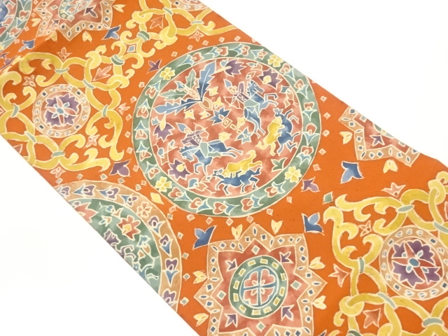 丸文に騎馬人物・花唐草・華文模様名古屋帯